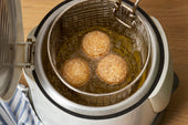 Modern deep fryer used for efficient, precise frying.