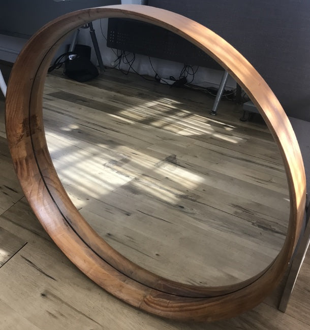 Yarrabah Round Mirror 80cms round Pine Wood. II is a perfect circle of glass encompassed by a solid wood frame with narrow edging