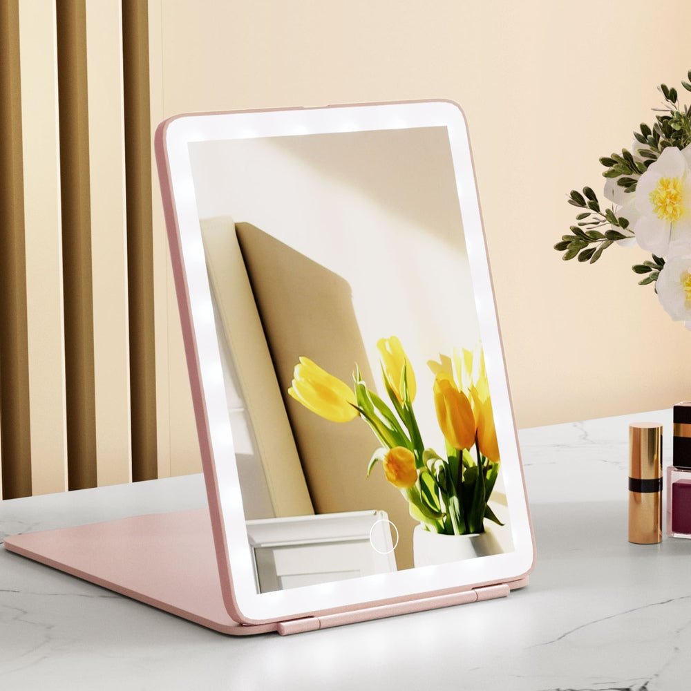 Travel-Friendly Pink LED Makeup Mirror with Customizable Brightness and Foldable Design