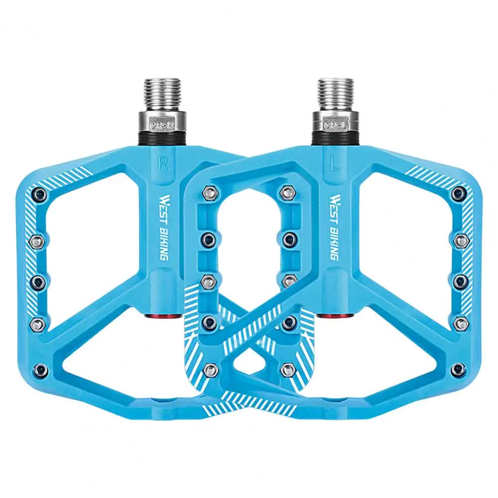 pair of wide pedals with non-slip surface and repair function, blue