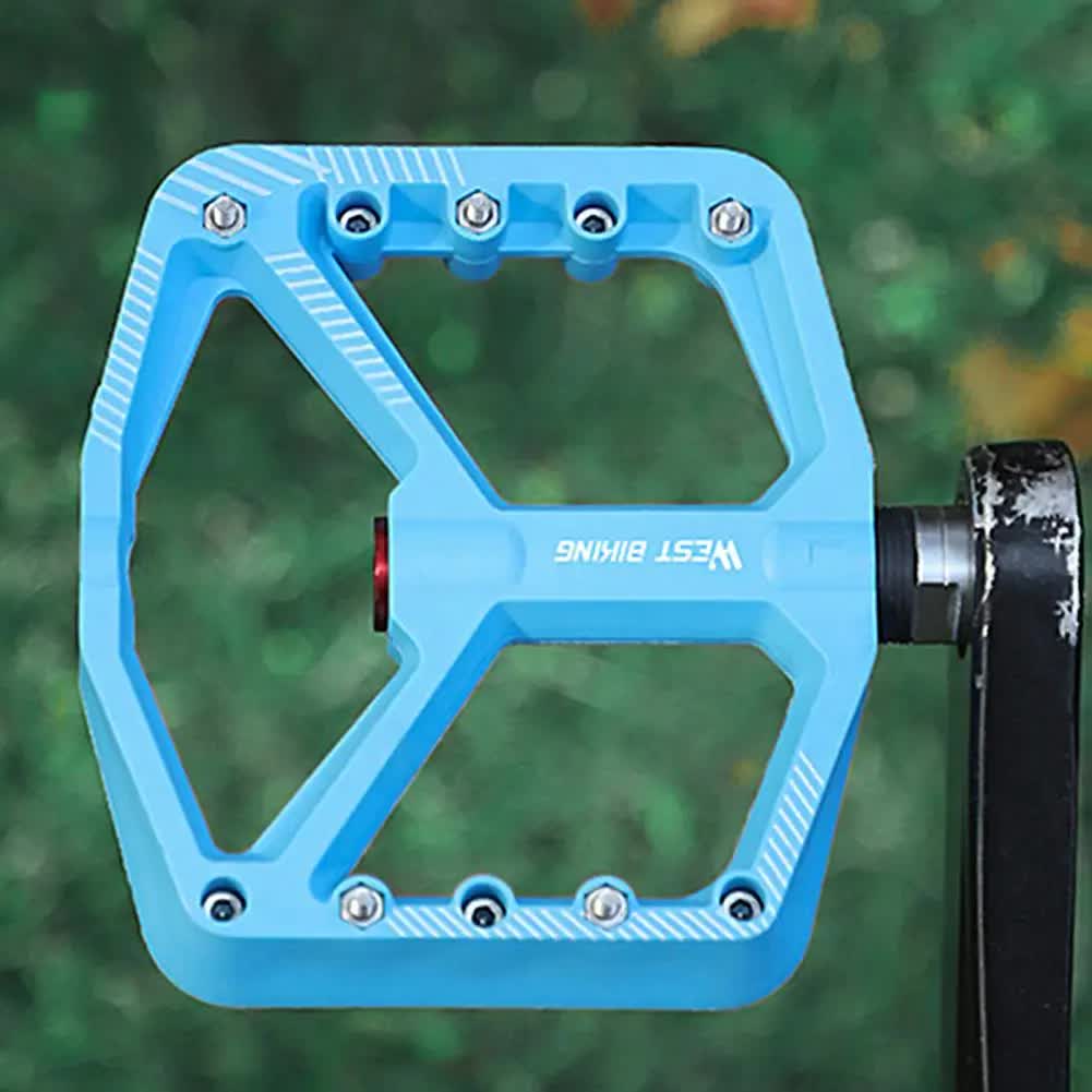 pair of wide pedals with non-slip surface and repair function, blue