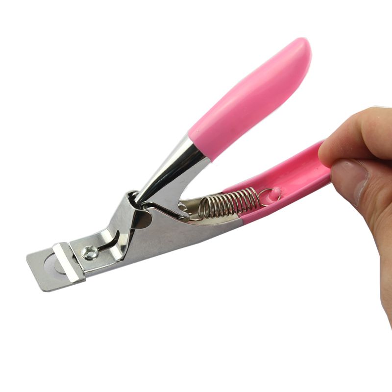 Pink nail scissors and tipping pliers