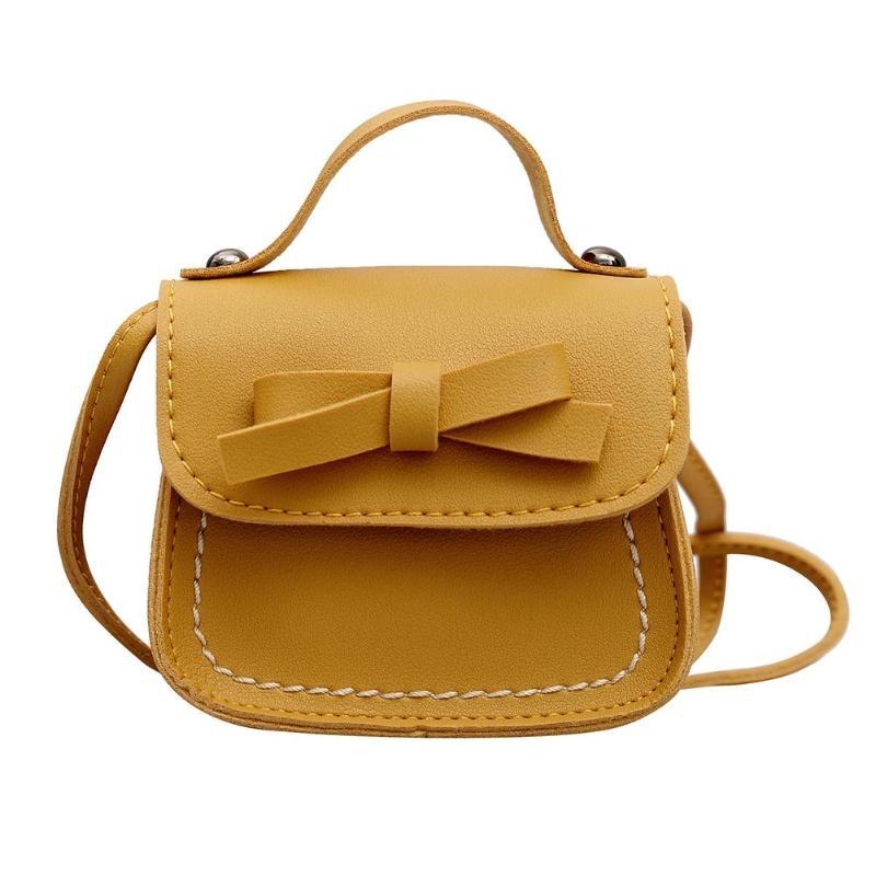 Mini Bowknot Pu Leather Baby Girls Messenger Bag - Yellow