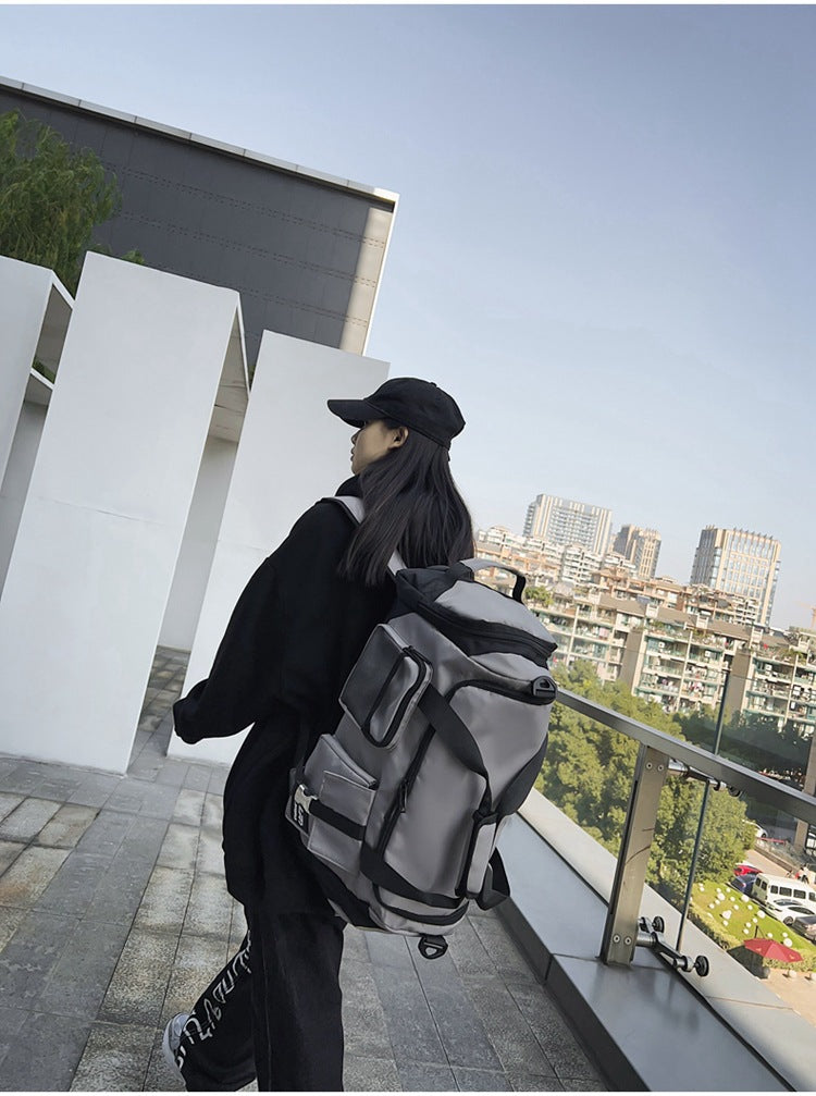 Grey Unisex Travel Bag with Utility Buckles and Wet/Dry Compartments