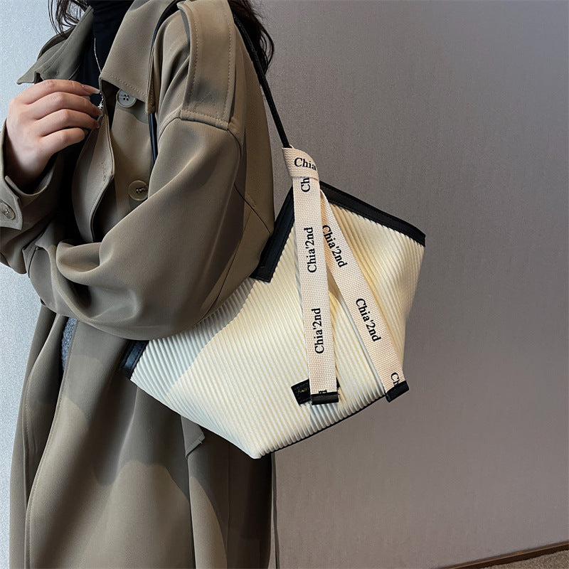 Chic Textured PU Leather Tote Bag with V-Cut Design & Decorative Ribbon Strap Accent(black)