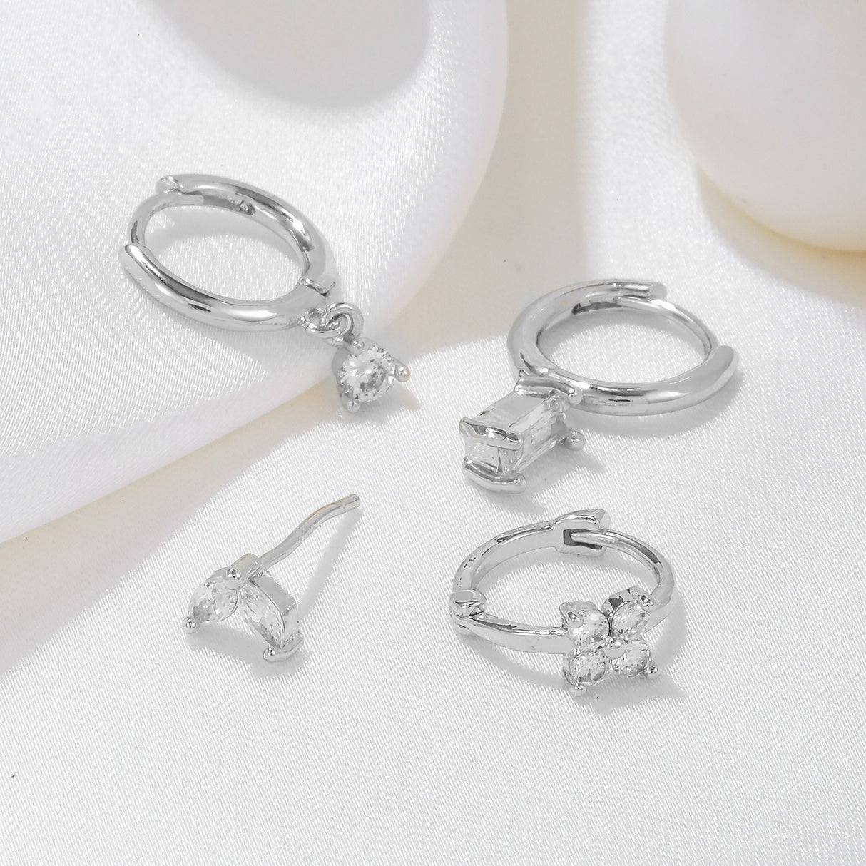 Four-piece set Gold Delicate CZ Earring Stacking Set - Huggie Hoops & Studs for Multiple Piercings