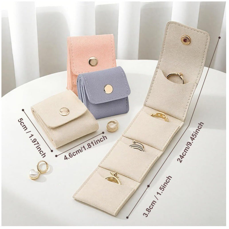 Grey Portable Mini Jewelry Pouch Soft Velvet Travel Organizer for Rings and Earrings Compact Snap Button Storage Bag Ideal for Daily Use