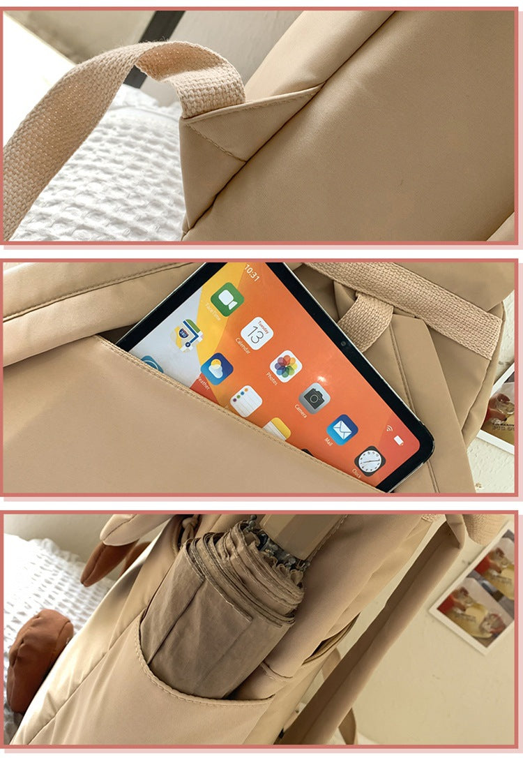 Black Lightweight Nylon Waterproof Schoolbag for Children - Large Capacity Daypack with Ugly-Cute Cat Design