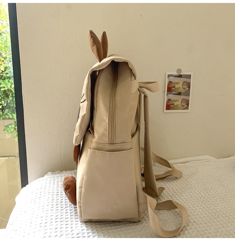 Khaki Lightweight Nylon Waterproof Schoolbag for Children - Large Capacity Daypack with Ugly-Cute Cat Design