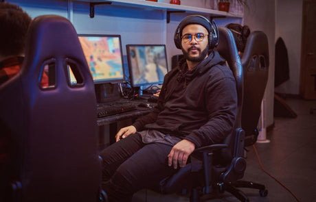 "Adjustable gaming chair showing optimal settings for comfort and performance, including lumbar support, armrest height, and recline angle."