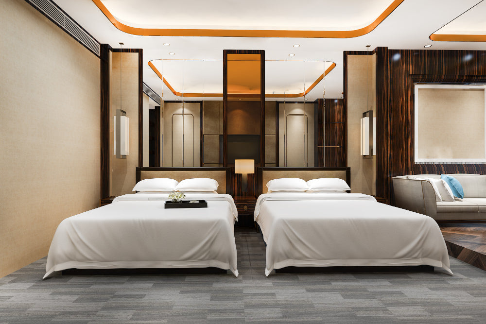  "Luxurious king size bed with premium bedding and elegant headboard, showcasing the upscale comfort and design of a Presidential Sleep Suite."