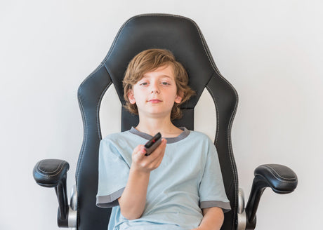 "Close-up of a durable gaming chair with reinforced stitching, heavy-duty base, and ergonomic cushioning, designed to withstand long-term use."