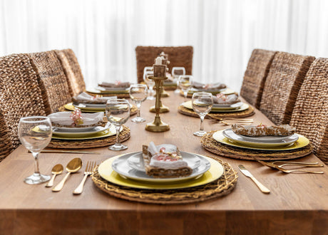 “Elegant extendable dining table set for guests, featuring hidden leaf extension and seating for up to ten in a stylish dining room.”