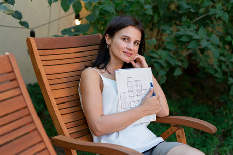 "Durable outdoor chairs on a patio, highlighting weather-resistant materials like treated wood, metal, and UV-protected fabric designed to withstand the elements."