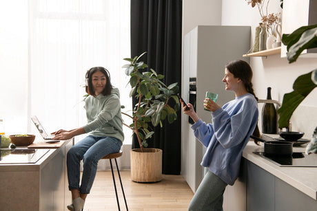 “Smart dining table with built-in wireless charging pads and USB ports, blending technology with modern design in a stylish dining room.”