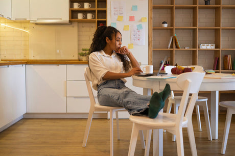 “Multi-purpose dining table used for both family meals and children’s homework, set in a cozy, functional living space.”