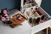 “Elegant dressing vanity with a mirror, organized cosmetics, and built-in lighting—designed to streamline morning routines and add a touch of luxury to the bedroom.”