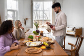 “Vintage wooden heirloom dining table surrounded by family members, reflecting generations of shared meals and memories.”