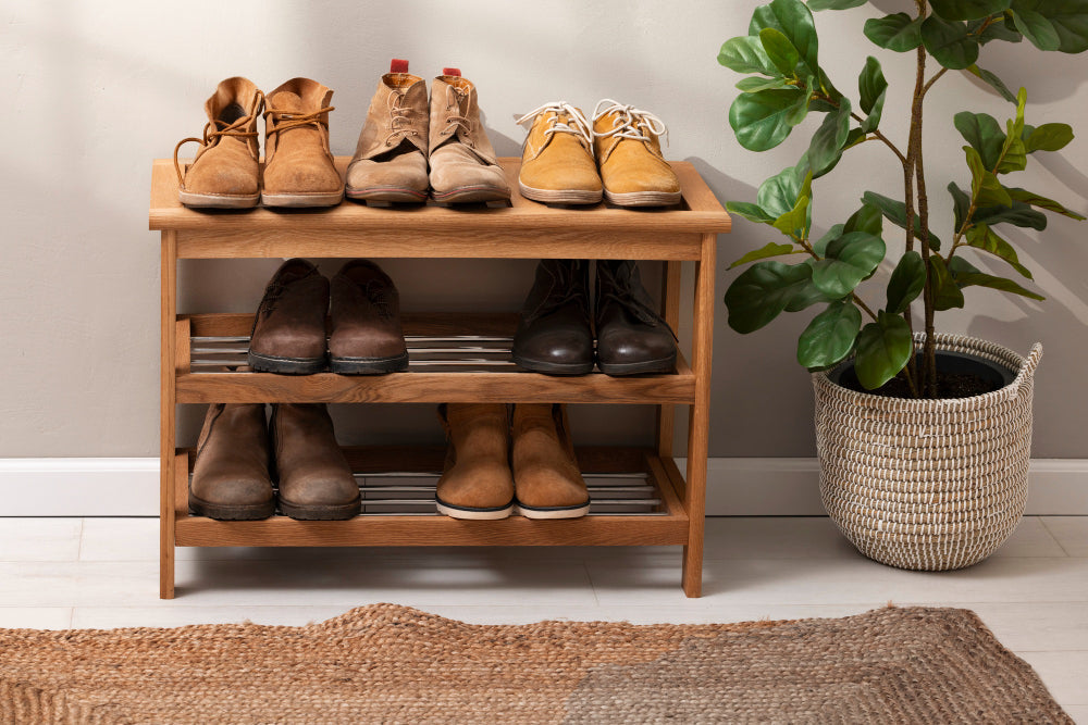 "Stylish entryway setups with designer shoe storage solutions, including built-in benches, mirrored cabinets, floating shelves, and statement units."