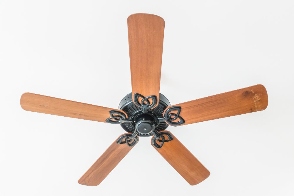 “Ceiling fan with power usage chart showing average energy consumption between 15 and 90 watts depending on size and speed setting.”