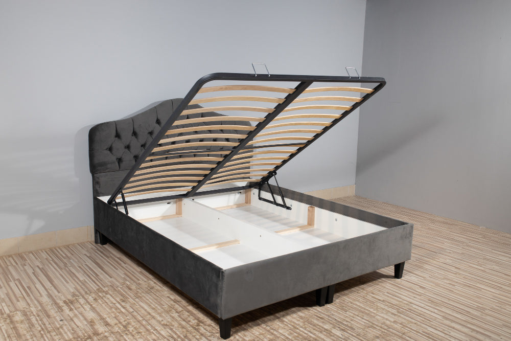 “Ottoman bed with hydraulic lift-up mattress base revealing hidden storage space underneath.”