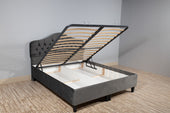 “Ottoman bed with hydraulic lift-up mattress base revealing hidden storage space underneath.”