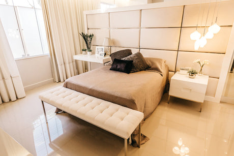  "Stylish small master bedroom with a double mattress, smart storage, and minimal furniture, showcasing an efficient and elegant layout."
