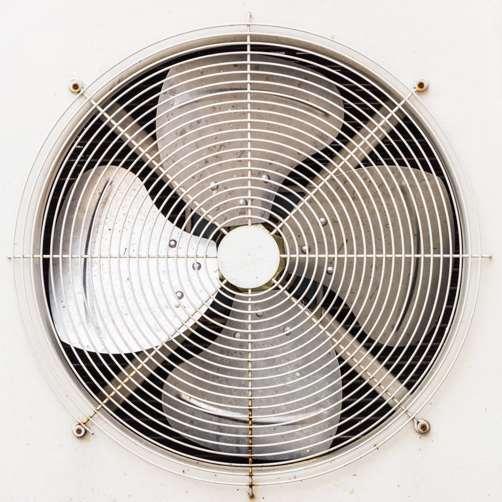 "Step-by-step guide to cleaning an evaporative cooler, including cleaning water tank, cooling pads, and interior parts."