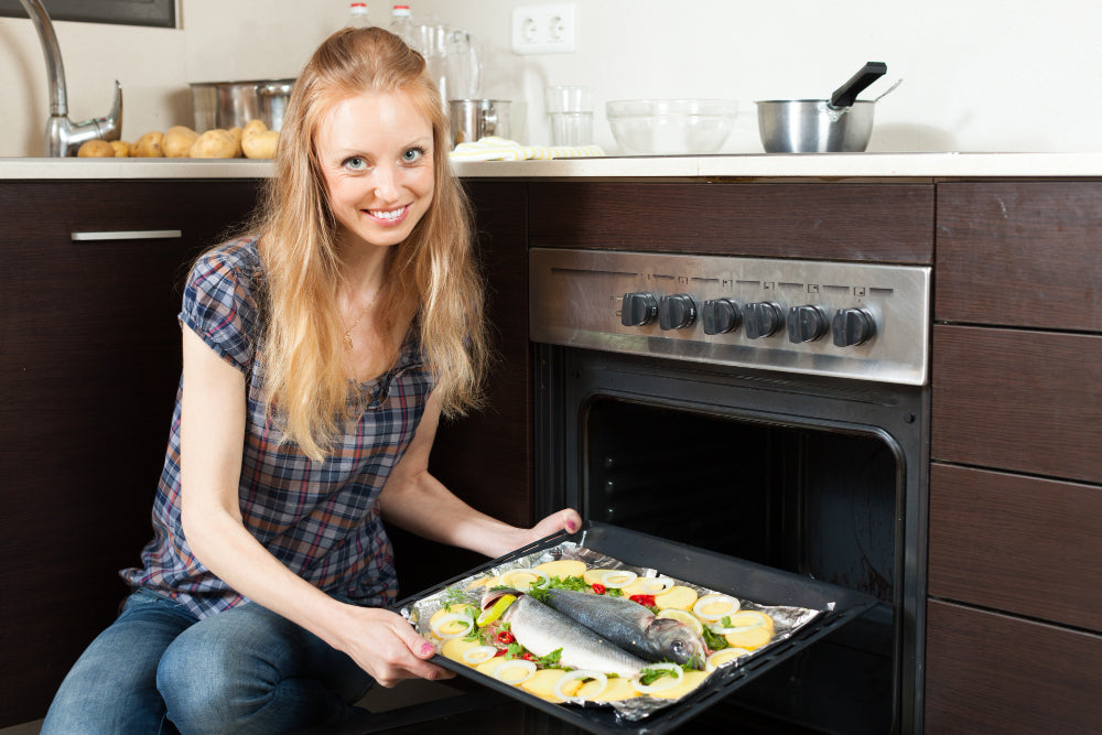 "Classic dishes like samosas and roast chicken being adapted for air fryer cooking, showing even browning and reduced oil use."