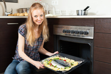 "Classic dishes like samosas and roast chicken being adapted for air fryer cooking, showing even browning and reduced oil use."