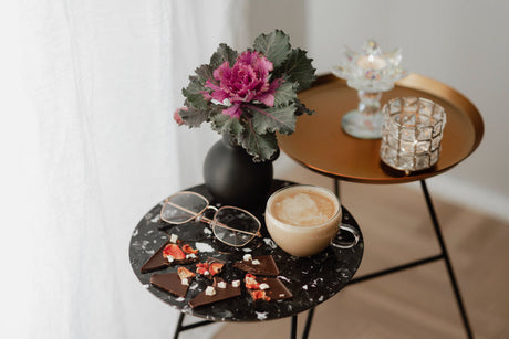 "Collage of six trending side table designs for 2025, including minimalist, sculptural, vintage-inspired, and multifunctional styles in modern interiors."