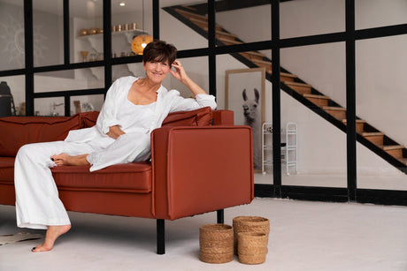 "Collection of stylish 2025 armchairs in various colors, shapes, and materials, showcasing current interior design trends."