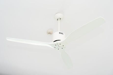 “Ceiling fan spinning counterclockwise in summer mode to create a cool downward breeze that helps lower perceived room temperature.”