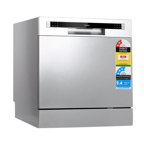 “Open dishwasher with dishes neatly arranged—plates in the bottom rack, cups and bowls on the top rack, and cutlery in the basket—demonstrating ideal loading for thorough cleaning.”