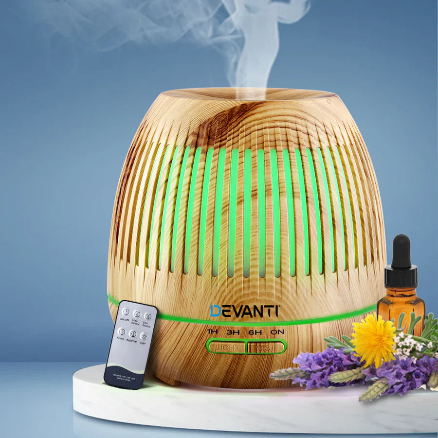 “Cool mist humidifier operating in a bedroom to maintain ideal indoor humidity, potentially easing asthma symptoms.”
