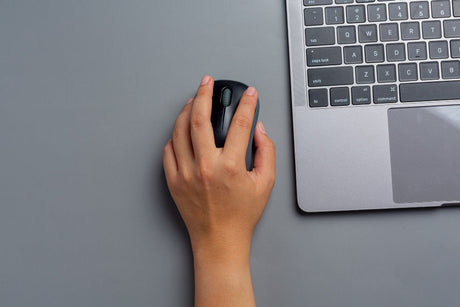 "Display of computer mice from early wired models to modern wireless and ergonomic designs, highlighting technological and functional advancements."