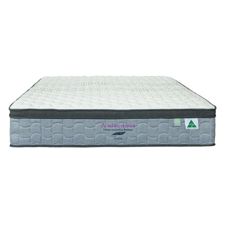 "Side-by-side comparison of a double and queen mattress in a bedroom setting, illustrating differences in width, length, and sleeping space."
