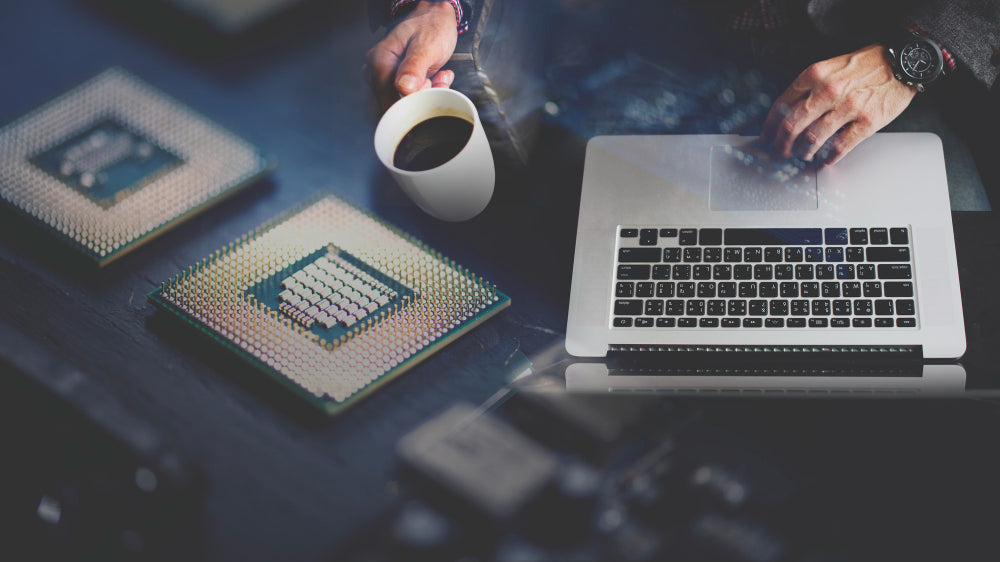  "Close-up of a modern laptop motherboard highlighting the processor chip, symbolizing advancements in speed, efficiency, and AI capabilities in 2025 models."
