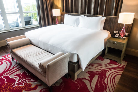 "Elegant bedroom with a premium king size mattress, showcasing plush layers, upscale materials, and refined design for maximum comfort."
