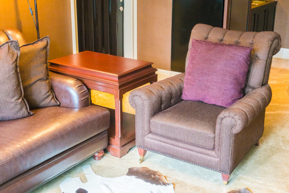 "Compact recliners arranged in a small living room setup, showcasing designs that maximize comfort without taking up too much space."