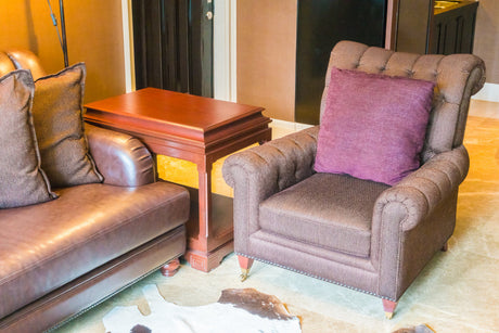 "Compact recliners arranged in a small living room setup, showcasing designs that maximize comfort without taking up too much space."