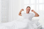 "Split-king adjustable mattress in a modern bedroom, with dual sides elevated independently for personalized comfort and support."