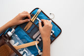 "Open suitcase with neatly arranged packing cubes and organizers, showing efficient use of space and clutter-free travel packing."