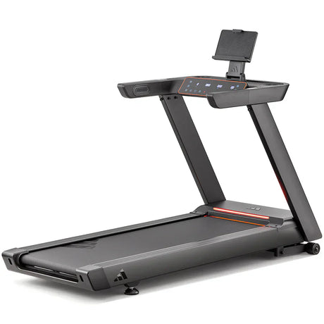 "Person adjusting treadmill settings on a digital display panel to calibrate distance tracking accurately."