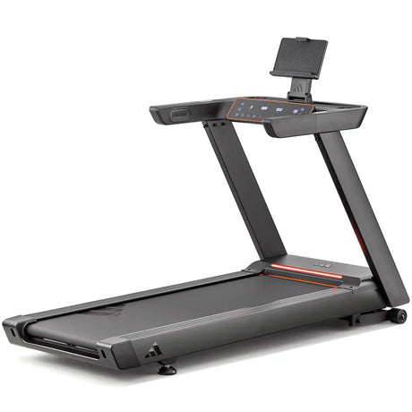 "Person adjusting treadmill settings on a digital display panel to calibrate distance tracking accurately."