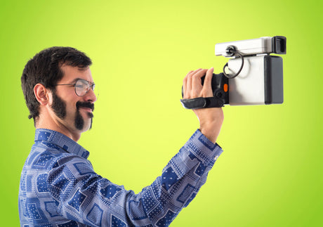 "Progression of webcam designs from early low-res models to sleek HD streaming cameras, illustrating advancements in video quality and features."