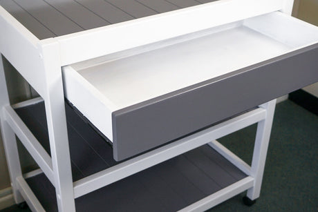 "Wood and metal kitchen trolleys side by side, comparing aesthetics, durability, and functionality."