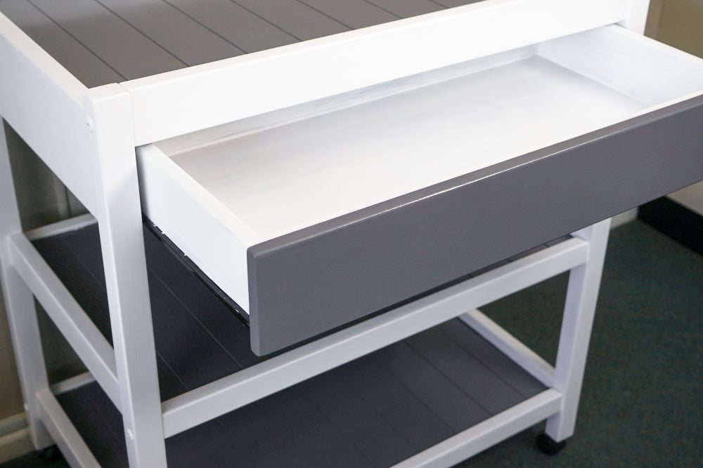"Wood and metal kitchen trolleys side by side, comparing aesthetics, durability, and functionality."