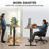 FORTIA Sit to Stand Standing Desk, 160x60cm, 72-118cm Electric Height Adjustable, Walnut Style Desktop/Black Frame - Side View