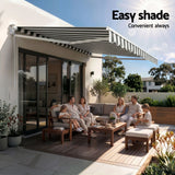 Instahut Retractable Folding Arm Awning Manual Sunshade 4.5Mx3M Grey White - Low Angle